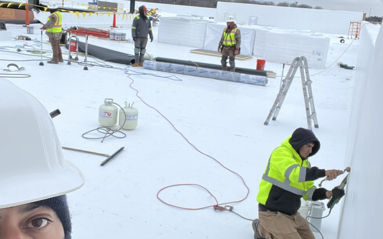 Commercial TPO flat roof install with bilingual crew in Eden Prairie, MN by Altus Roofing