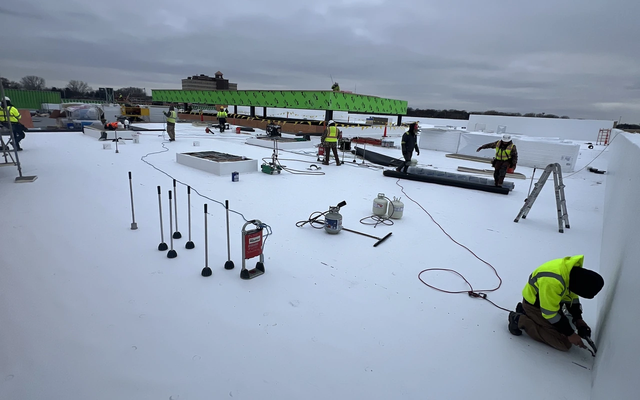 Built-up roofing system on industrial facility in Brooklyn Park, MN by Altus Roofing