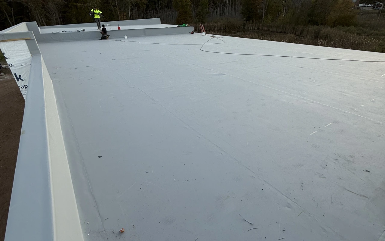 EPDM rubber roofing on commercial property in Minnetonka, MN by Altus Roofing