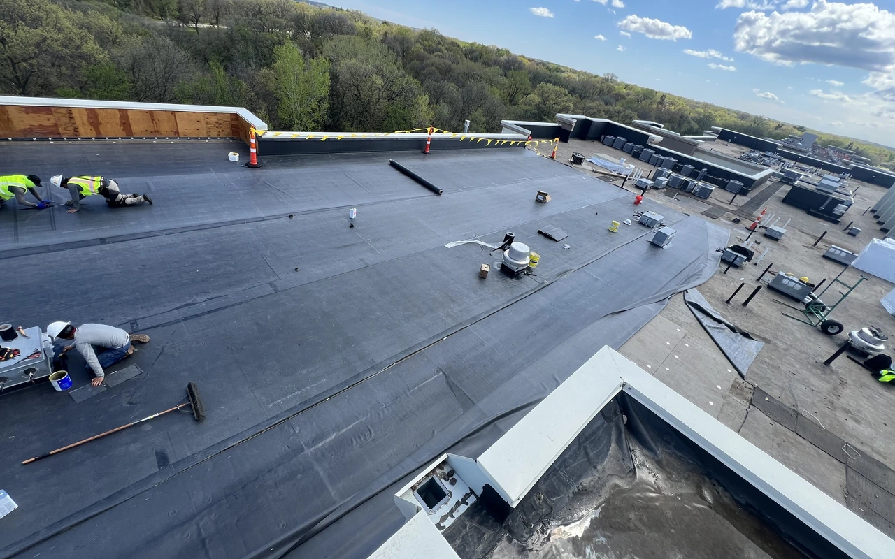 Post-storm commercial flat roof replacement in St. Paul, MN by Altus Roofing