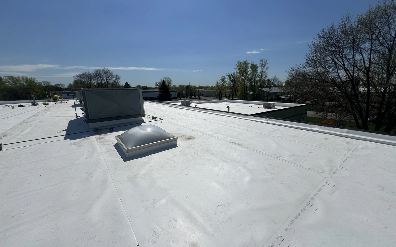 Hail-damaged TPO membrane replacement in Plymouth, MN by Altus Roofing