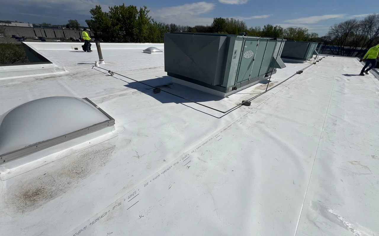 Commercial flat roof repair and drain replacement in St. Paul, MN by Altus Roofing
